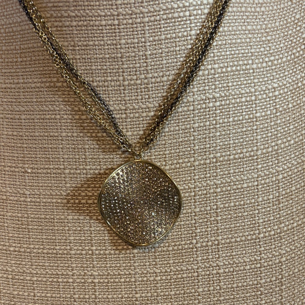 Elegant Gold and Silver Pendant Necklace